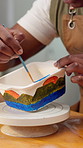 Hands, person and painting ceramic for art in workshop, creative decoration or handmade craft. Paintbrush, man and pottery in studio for skill development, artistic process and hobby with design