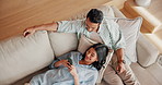 Couple, chilling and bonding with phone in lounge, talking or streaming video with partner in house. Relax, above and happy people with mobile on couch, chat and watching movie with spouse in home