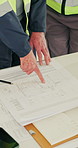 Engineer, team and hands with blueprint, construction and planning for renovation project and ideas. Civil engineering, above and people with paperwork, discussion and info for property development