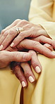 Couple, relax and holding hands on date for love, support and emotional connection with loyalty. People, spouse and quality time with partner, physical affection and romantic moment for commitment