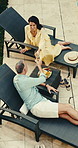 Happy, couple or champagne with cheers in resort for holiday celebration, travel or vacation trip. Top view, man and woman with smile, toast or drink for summer break or honeymoon together in retreat
