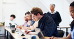 Writing, exam and man with tablet in classroom, education and thinking of answer or research on app. University student, reflection and people with tech, knowledge and reading questions on website