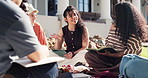 Outdoor, college and students on grass for study group, learning and talking for exam prep together. University, campus and friends with textbooks, chat and break for education, assignment and test