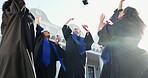 Celebration, friends and cap throw for graduation pride, degree completion or clap for new chapter. Huddle, happy people or hat toss outdoor for graduate class, applause or high five for PHD on flare