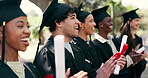 Smile, man and students with diploma at graduation, farewell and celebration of degree completion. People, applause and graduate outdoor with regalia, university recognition and educational milestone