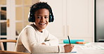 Face, child and headphones in house with homework, cognitive development or listen to music playlist. Happy, boy and kid study in home with school task, education and audio tech for streaming radio.