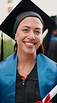 Graduation, face and woman on campus with diploma, college pride or optimism in academic achievement. Education, happy and university student with portrait, confidence and success in degree ceremony.