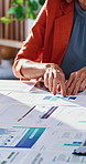 Hands, woman and graphs in meeting with documents, data analysis and finance report for profit. People, collaboration and review in office with statistics, kpi results and charts for financial growth