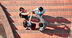 Above, students and high five at college for education, good news and success of academic results. Smile, people and applause at campus for celebration, assessment completion and learning milestone