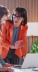 Manager, team and conversation in creative office with laptop, plan and explain AI marketing project. People, talk and review in business with computer, idea and innovation for digital advertising.