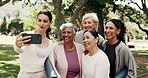 Selfie, park and fitness coach with mature group for outdoor memory, exercise or wellness together. Female people, personal trainer or smile with technology for capture moment, photography or picture