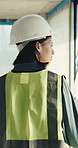 Engineering, woman and inspection at construction site with blueprint, plan and check design safety. Supervisor, person and engineer in building with layout document, property evaluation and review.