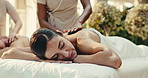 Spa, hot stone and couple on bed for back massage with physical therapy, zen or treatment at resort. Hotel, hospitality and mature people for stress relief, muscle reflexology or holistic detox