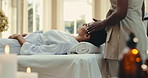 Spa, temple and woman with facial, massage and relax for stress relief, holistic healing and zen. Hospitality, resort and masseuse with person for treatment, self care and therapy for circulation