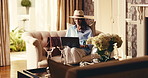 Smile, woman and check in at hotel with laptop, online booking and room details at holiday resort. Happy, mature person and guest at accommodation with pc , reservation and information for hospitality