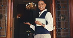 Face, woman and concierge with tablet at front door for hotel, welcome and booking accommodation. Portrait, receptionist and digital tech for guest, reservation and customer service for hospitality