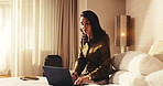 Hotel, travel and business woman on laptop for conference schedule, agenda or planning on work trip. Hospitality, typing and mature person on computer for check in, workshop itinerary and reservation