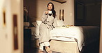 Thinking, smile or woman in hotel room with coffee, trip reflection or calm moment on holiday break. Chill, tourist or mature person with warm drink, peaceful perspective or mindfulness on vacation.