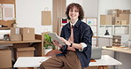 Man, tablet and face in small business for logistics, stock control and inventory update on website. Entrepreneur, tech and typing in startup for contact us with smile for social media engagement