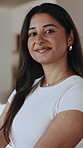 Face, woman and relax at house with smile, good mood and calm morning for weekend unwind in lounge. Portrait, female person and comfortable in home with happiness, positive attitude and stress relief