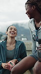 Fitness, friends and laugh in city with conversation, funny workout fad and exercise break on bridge. Happy, women and talk outdoor in urban town with joke, bonding together and training recovery.