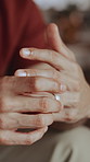 Conflict, overthinking or hands in home with wedding ring, anxiety or overwhelmed in marriage affair. Stress, tension or man with jewelry, commitment reflection or contemplating on legal separation.