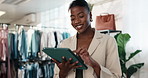 Fashion, woman and plan in clothing store with tablet, stock control and online order on CMT website. Happy, black person and typing in boutique with tech, retail merchandise or inventory management.