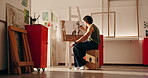 Man, artist and sketch for art in studio, creativity and technique with skill and shading. Person, easel and drawing for artistic expression, talent and design process for artwork in workshop