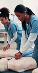 People, nurses and dummy at hospital for cpr, demonstration and medical course for critical care. Nursing, women and compression in office with mannequin, rescue training and emergency resuscitation