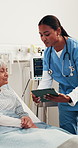 Tablet, nurse and old woman in hospital bed, medical discussion or care plan for recovery report. Ward, tech and healthcare worker with senior patient, talk or smile for rehabilitation progress