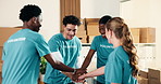 Happy, volunteer and team in charity with hands together, applause and collaboration for non profit. People, clap and celebration in NGO for social responsibility goals, outreach and project success.