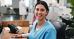 Face, happy and receptionist by computer in hospital for administration duty, research or telehealth. Person, nurse or medical assistant at desk for patient triage, appointment and clinic schedule
