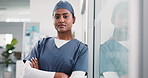 Healthcare, face or woman in hospital with arms crossed, surgical nurse or about us in patient care. Portrait, serious or doctor with confidence, wellness specialist or ambition in medical industry.
