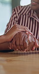 Senior mother, love and holding hands with daughter in home, support and connection with old parent. Happy people, together and bonding with elderly mom, listening and conversation in family house