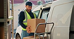 Man, unpacking and van with boxes for delivery, logistics or online order for distribution handoff. Person, unloading and transport at warehouse with package, supply chain and shipping for ecommerce
