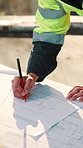Person, architect or hands with blueprint for drawing, planning renovation or expansion project. Floorplan, draft and engineer at site for property development, circle design or structure instruction