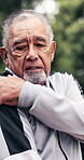 Fitness, injury and old man with shoulder pain, outdoor or thinking with physical discomfort at park. Massage, muscle strain and senior person with sprain, reflection and exercise accident in nature
