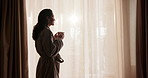 Happy, thinking and woman with drink at hotel for break on vacation, holiday and relax in morning. Travel, window and person with coffee, reflection and view for accommodation, hospitality or getaway