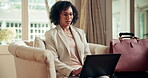 Laptop, worry and travel with business woman in hotel for conference itinerary, research and report. Corporate retreat, vip event and tradeshow deadline with mature employee and  typing for update