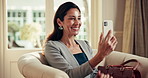 Happy, businesswoman and video call in hotel with phone, wave or conversation for overseas work trip. Mature person, talk and greeting contact in lodge with tech, online meeting and travel for job.