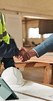 Carpenter, people and handshake in factory with deal, approval and welcome to woodwork operations. Businessman, shaking hands and agreement with carpentry supervisor, partnership and collaboration.