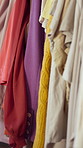 Fashion, clothes and collection in store for shopping, wardrobe option or garment for thrift market. Retail, apparel and outfit options in second hand shop for style, selection and Black Friday sale.