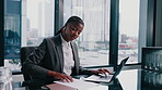 Laptop, typing and black woman in office with paper for financial report, audit review or accounting. Reading document, computer and person in corporate enterprise, income statement or balance sheet