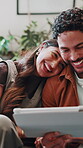 Couple, sofa and tablet to relax and laugh for funny post, online entertainment or comedy movie. Happy man, woman and technology on lounge couch with app subscription, connection and quality time