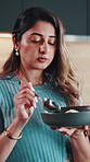 Happy, eating and woman with bowl in kitchen for healthy meal, balanced diet or nutrition in home. Morning, house and person with fruit, snack and food for wellness, vitamins and energy for day