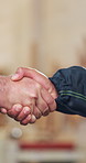 Carpentry, handshake and men in warehouse with inspection, deal and approval in safety review. Woodworking, space and engineer with shaking hands, partnership agreement and clearance in compliance.