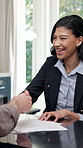 Success, realtor or client in house with handshake, deal close or agreement in property transaction. Happy, broker or woman with shaking hands, ownership transfer or selling process in home purchase.