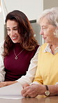 Budget, senior mother or woman in home with laptop, finance review or guidance in pension management. Happy, adult daughter or old person with paper, savings evaluation or support on retirement fund.