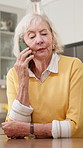 Gossip, conversation and old woman in home with phone call, connectivity and relax on weekend break. Elderly person, discussion and retirement in house with mobile tech,  contact or internet network.