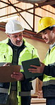 Carpenter, men and clipboard in workshop with tablet, training intern and problem solving for work. People, talk and apprentice in factory with carpentry supervisor, manufacturing checklist and plan.